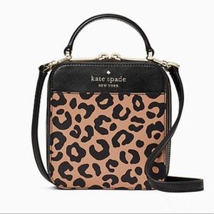 - KATE SPADE DAISY GRAPHIC LEOPARD VANITY CROSSBODY BAG BLACK REMI NWT $249